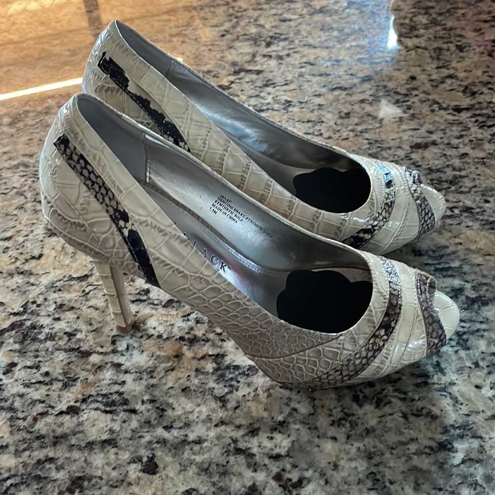 White House Black market animal print heels